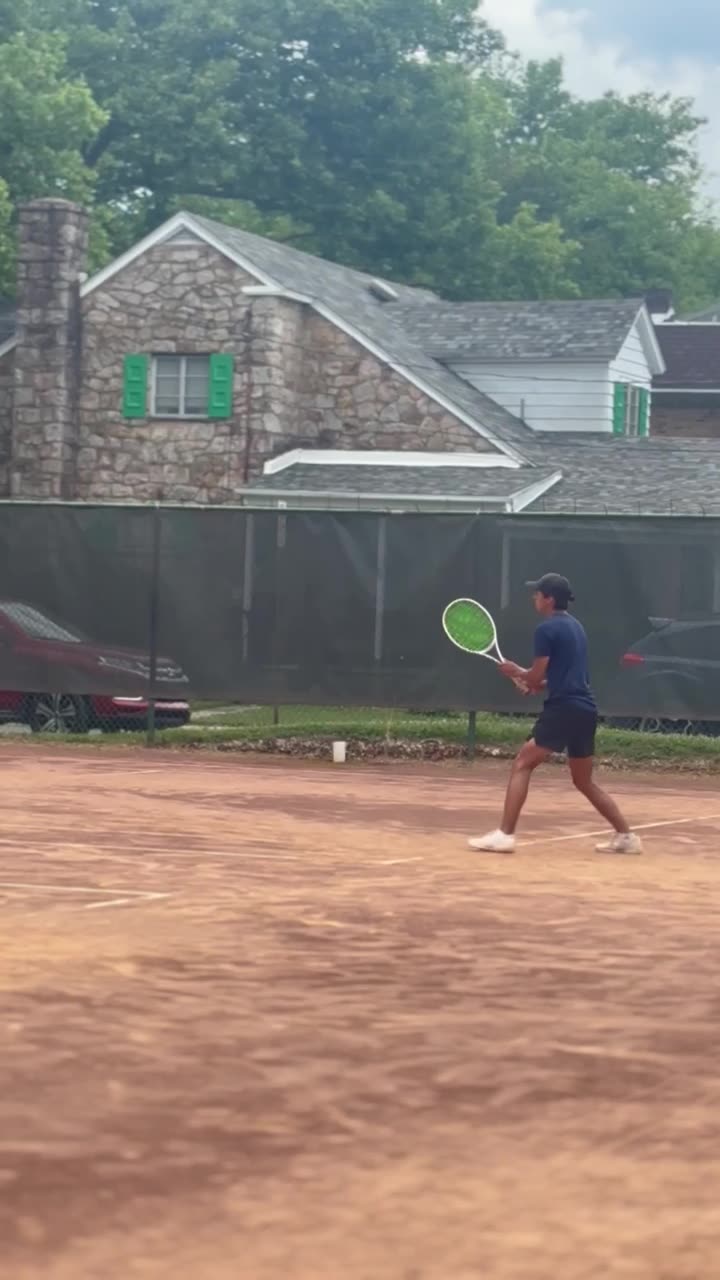 A junior player rallying during a PlayTennisLV session at Oakmont